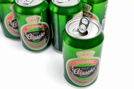 Danish beer in cans Tuborg Classic. The most popular beer. Copenhagen, Denmark - March 4, 2024.