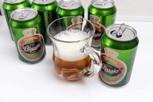 Danish beer in cans Tuborg Classic. The most popular beer. Copenhagen, Denmark - March 4, 2024.