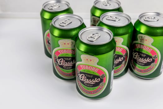 Danish beer in cans Tuborg Classic. The most popular beer. Copenhagen, Denmark - March 4, 2024.