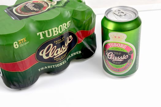 Danish beer in cans Tuborg Classic. The most popular beer. Copenhagen, Denmark - March 4, 2024.