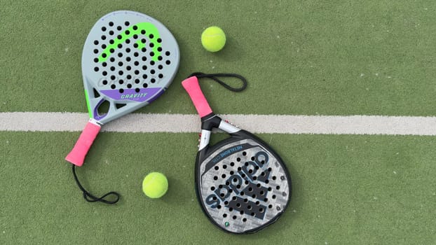 Kyiv, Ukraine, May 15, 2024 paddle tennis racket and balls, padel game kit. High quality photo