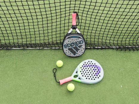 Kyiv, Ukraine, May 15, 2024 paddle tennis racket and balls, padel game kit. High quality photo