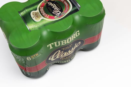 Danish beer in cans Tuborg Classic. The most popular beer. Copenhagen, Denmark - March 4, 2024.