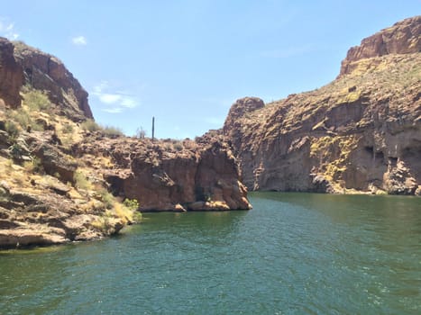 Rugged Rocky Shoreline of Canyon Lake, Arizona. View from Boat. Water recreation in the Arizona desert. High quality photo