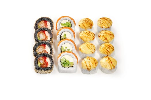 Black rice uramaki with tempura shrimp and tobiko, Philadelphia with salmon and rolls with seared cheese topping, presented on white surface, perfect for culinary concepts and sushi menus