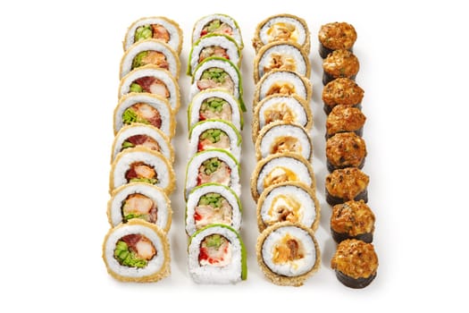 Set of crispy tempura rolls with chicken and shrimp, baked norimaki with cheese and seafood toppings, and classic uramaki topped with avocado, presented isolated on white background. Japanese snacks