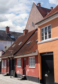 Koge, Denmark - May 1, 2023. Colorful old historic house in a street of Koge City. Traditional Scandinavian houses.