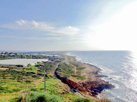 Natural landscape top view of the kibbutz agricultural farm and the Mediterranean Sea, Israel. High quality photo