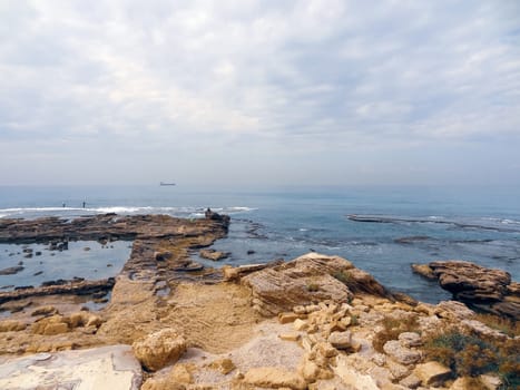 Rocky coast near the ancient Caesarea national park on the Mediterranean coastline, Israel. High quality photo