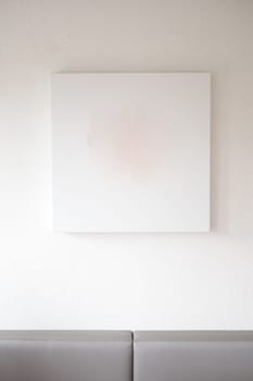 square shape empty photo frame on a white wall ,
