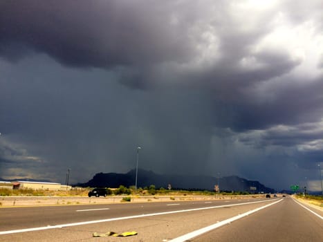 Amazing Summer Thunderstorm Over the Superstition Mountains in Arizona, Hwy 60. High quality photo
