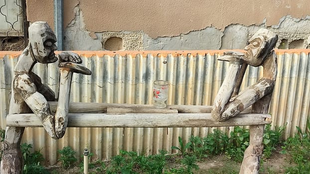 wooden sculptures, art in the courtyard on the street,. High quality photo