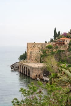 Historical Alanya Shipyard and Kizil Kule walls located in Alanya district of Antalya