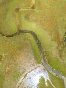 The meander in Antalya Sobucimen plateau. Aerial view of complex waterways weaving  through lush green fields