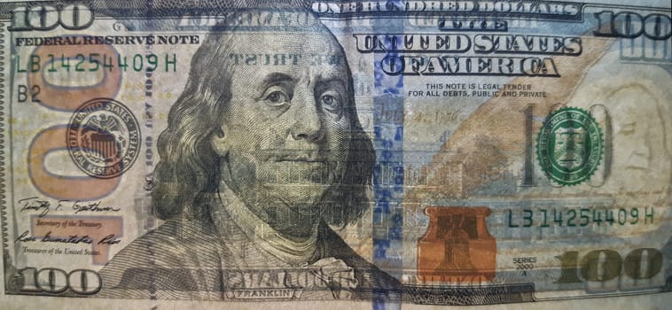 Series, year and number have been changed. Not for copying.Close-up of a 100 dollar bill, with transparency effect.
