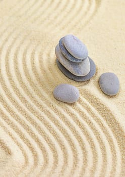 Background with stones on the sand. Selective focus. Spa.