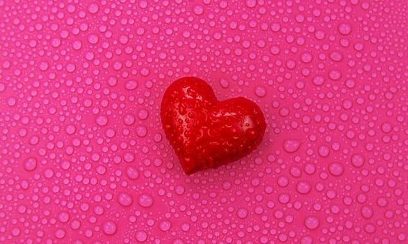 Wet heart background valentine. Selective focus. Red love.