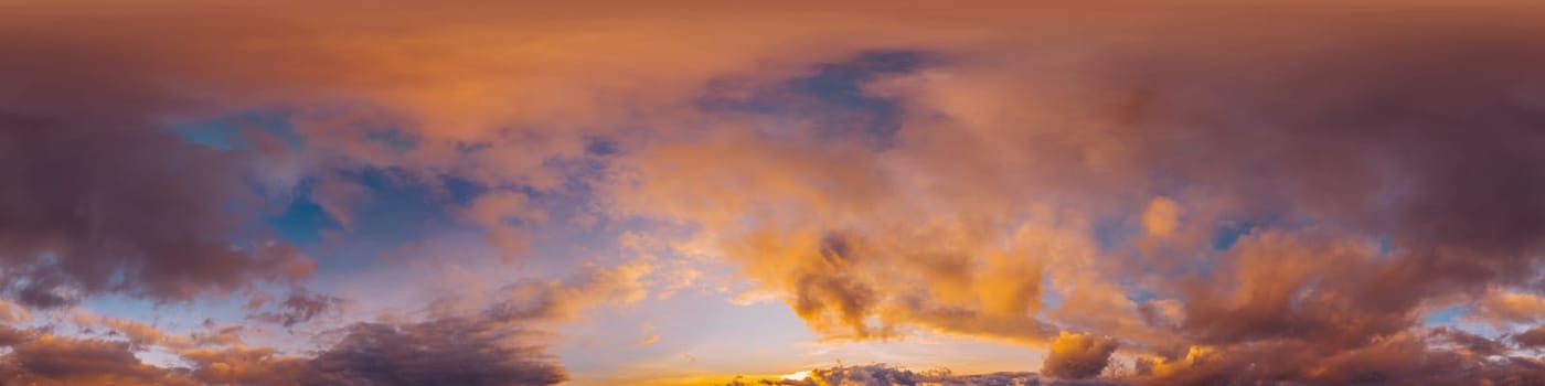 Bright sunset sky panorama with Cirrus clouds. Seamless hdr spherical equirectangular 360 panorama. Sky dome or zenith for 3D visualization, game and sky replacement for aerial drone 360 panoramas.