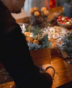 Workshop on crafting Christmas wreaths and New Year's decorations. High quality photo