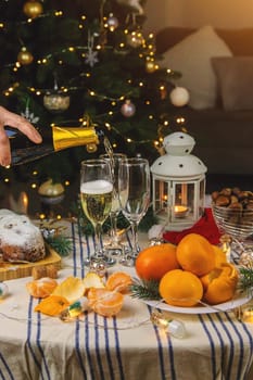 Champagne on the Christmas table. Selective focus. Holiday.