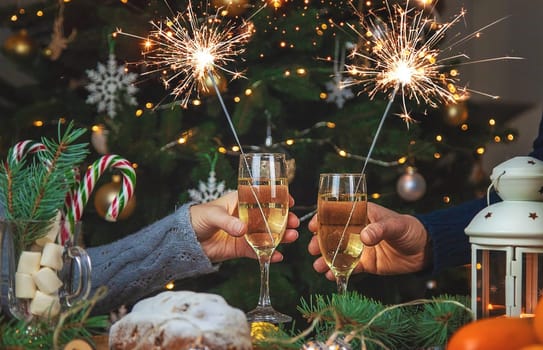 Champagne on the Christmas table. Selective focus. Holiday.