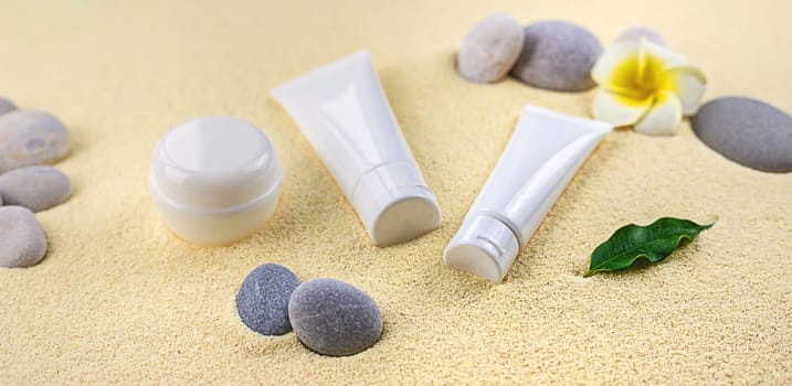 Cosmetics on the spa sea sand. Selective focus. Nature.