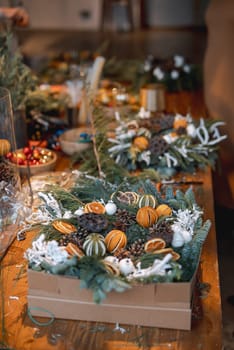 DIY session for creating Christmas wreaths and New Year's ornaments. High quality photo