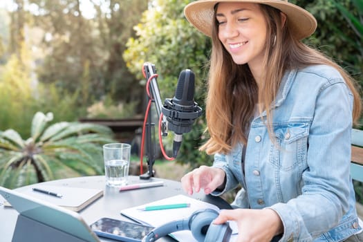 Radio broadcasting on air woman microphone. High quality photo