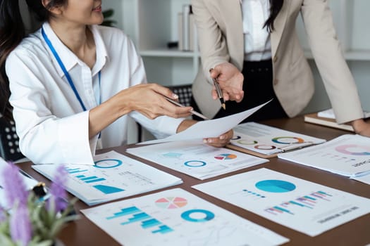 Business people discussing and brainstorming together in conference room during meeting at office. Strategy, Planning, Teamwork.