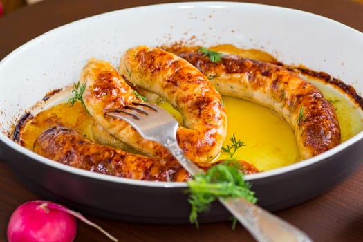 homemade sausage baked in the oven .