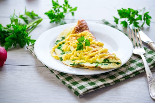 fried omelette stuffed with herbs, parsley, dill .