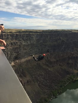 A BASE Jumper from the Perrine Bridge Above the Snake River in Twin Falls, Idaho. High quality photo