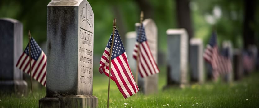 Memorial Day: American flags on gravestones in a cemetery during Memorial Day celebration.