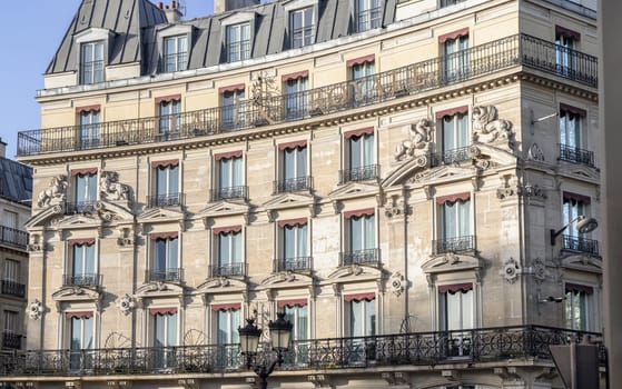 France, Paris - Jan 03, 2024 - Exterior architecture of La Villa Royale Hotel with typical balconies and windows in paris. Space for text, Selective focus.