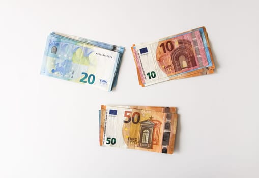 Euro money banknotes on a light background close up.