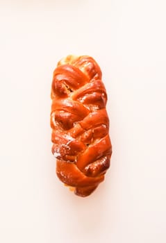 Freshly baked sweet buns. Homemade pastry on white background.