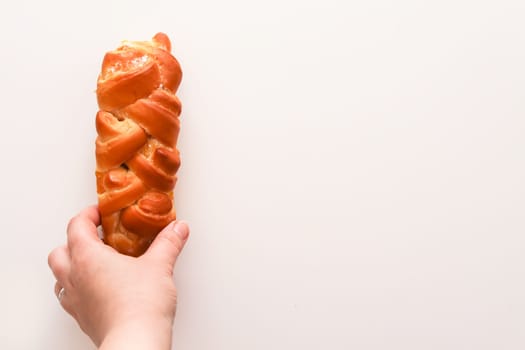 Freshly baked sweet buns. Homemade pastry on white background.