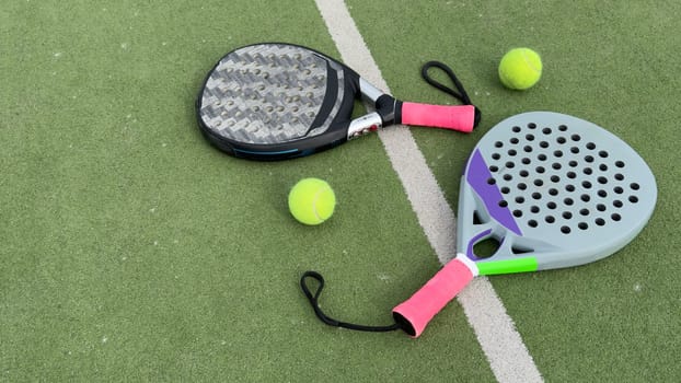 paddle rackets on the playing court. High quality photo