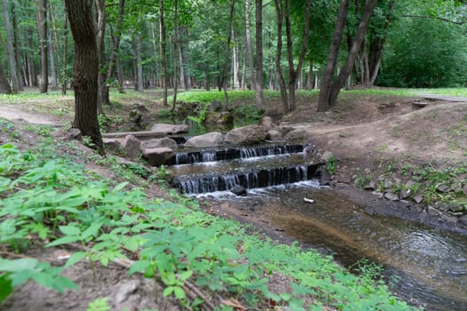 small artificial waterfall in the park
