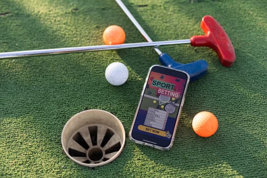 mini golf sports betting on a smartphone. High quality photo