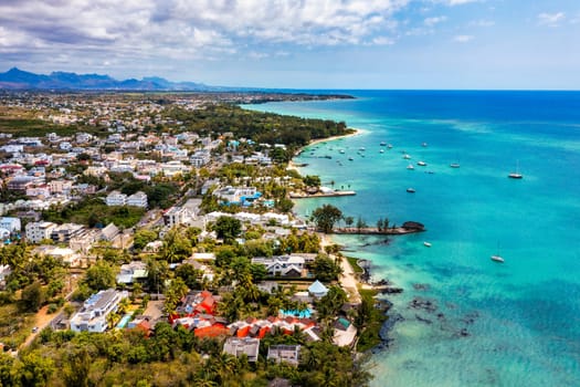 Mauritius beach aerial view of Mont Choisy beach in Grand Baie, Pereybere North. Mont Choisy, public beach in Mauritius island, Africa. Beautiful beach of Mont Choisy in Mauritius, drone aerial view.