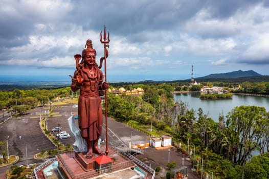 Shiva Statue, 33 m tall Hindu god, standing at the entrance of Ganga Talao - Grand Bassin lake the most sacred Hindu place on Mauritius. Hindu god Shiva, seen from above, Mauritius.