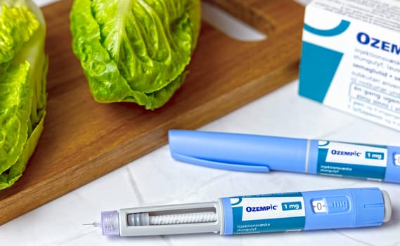 Original Danish Ozempic Insulin injection pen for diabetics and vegetables. Denmark - April 28, 2024