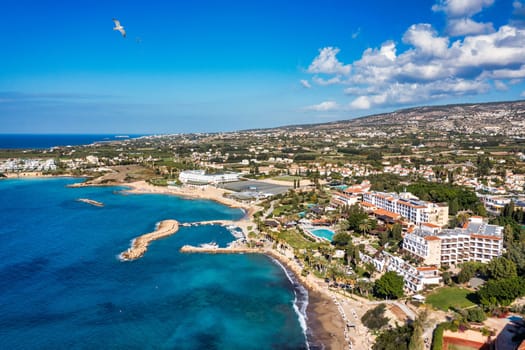 Aerial panoramic view of Coral bay beach, Cyprus. Overhead view of Coral Bay beach, Peyia village, Paphos district, Cyprus. Aerial view of Coral Bay beach in Peyia village, Cyprus.