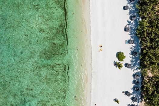 Ile aux Cerfs island with idyllic beach scene, aquamarine sea and soft sand, Ile aux Cerfs, Mauritius, Indian Ocean, Africa. Ile aux Cerf in Mauritius, beautiful water and breathtaking landscape.