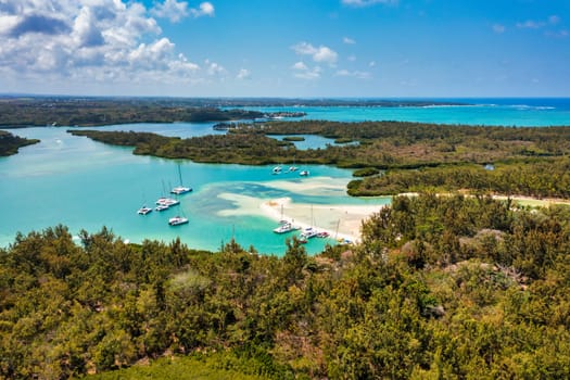 Ile aux Cerfs island with idyllic beach scene, aquamarine sea and soft sand, Ile aux Cerfs, Mauritius, Indian Ocean, Africa. Ile aux Cerf in Mauritius, beautiful water and breathtaking landscape.