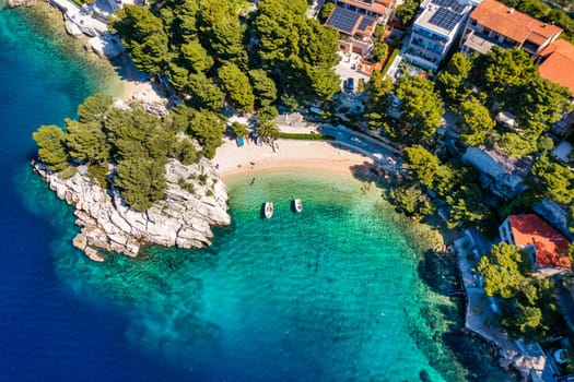 Amazing aerial view of the beautiful Podrace beach in Brela, Makarska Riviera, Croatia. Aerial view of Podrace beach and waterfront on Makarska riviera, Brela, Dalmatia region of Croatia.