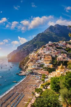 View of Positano with comfortable beach and blue sea on Amalfi Coast in Campania, Italy. Positano village on the Amalfi Coast, Salerno, Campania. Beautiful Positano, Amalfi Coast in Campania.
