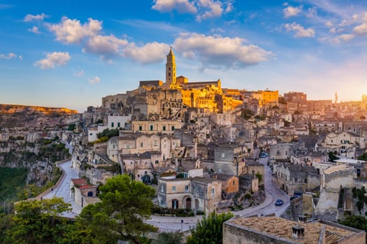 Panoramic view of the ancient town of Matera (Sassi di Matera) in a beautiful autumn day, Basilicata, southern Italy. Stunning view of the village of Matera. Matera is a city on a rocky outcrop.