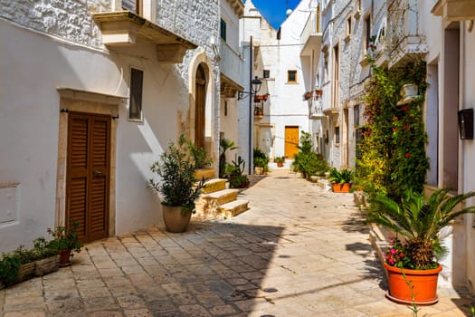 Scenic sight in Locorotondo, Bari Province, Apulia (Puglia), Italy. Characteristic streets in the Locorotondo in Puglia, Italy. Locorotondo is a town of the Metropolitan City of Bari, Apulia, Italy.